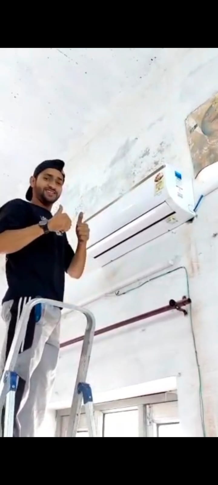 Split AC installation service by professional technician setting up air conditioner